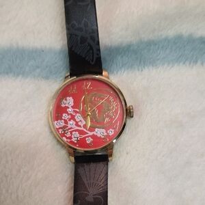 Elegant Red and Gold Floral Watch